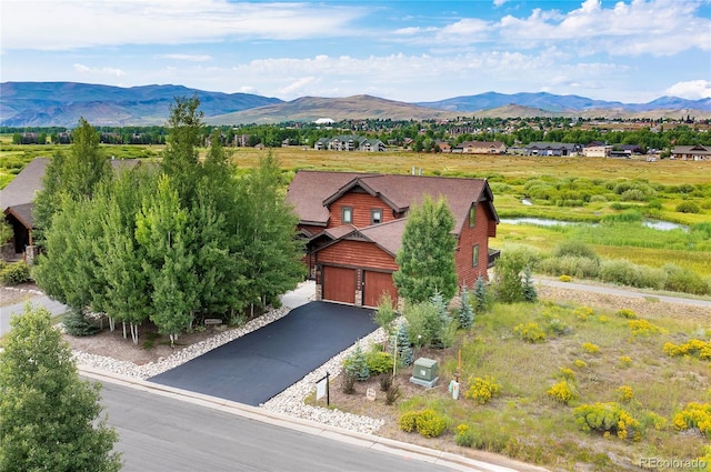 exterior space featuring a mountain view