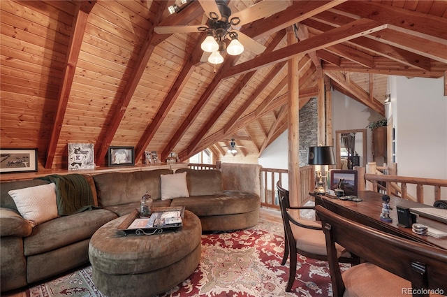 living room with ceiling fan, vaulted ceiling with beams, and wooden ceiling