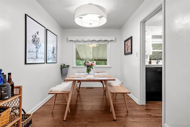 3231 S Elati St, Englewood, CO 80110 - dining space with wood finished floors and baseboards