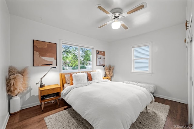 3231 S Elati St, Englewood, CO 80110 - bedroom with wood finished floors, baseboards, and a ceiling fan