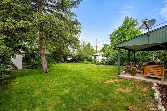 3231 S Elati St, Englewood, CO 80110 - view of yard with a patio area and an outdoor hangout area