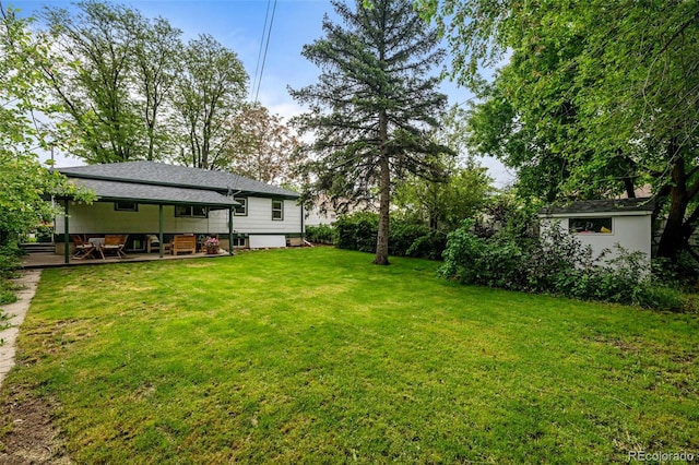 3231 S Elati St, Englewood, CO 80110 - view of green lawn featuring an outdoor structure