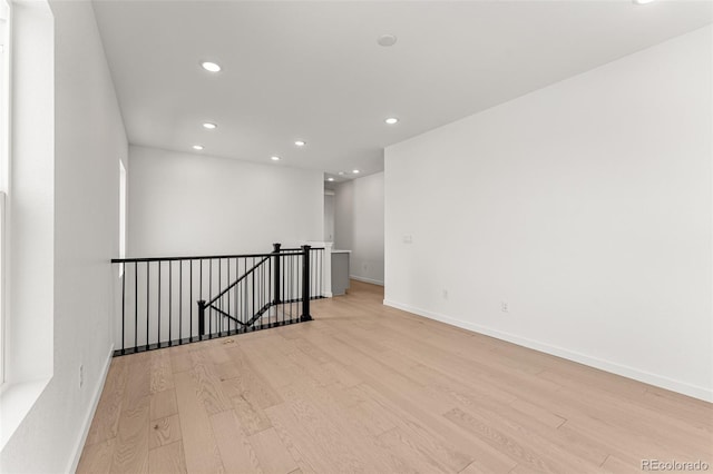 unfurnished room featuring light wood-type flooring