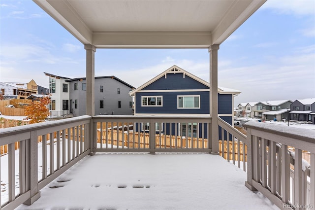 view of snow covered deck