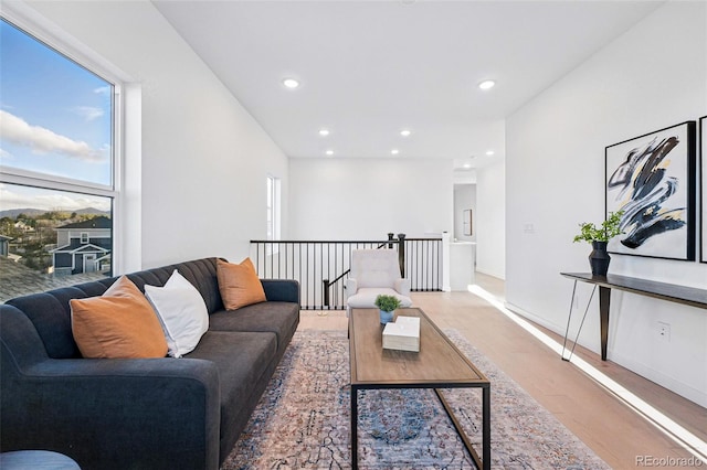 972 Arapahoe Cir, Louisville, CO 80027 - living room featuring recessed lighting, baseboards, and light wood-style floors