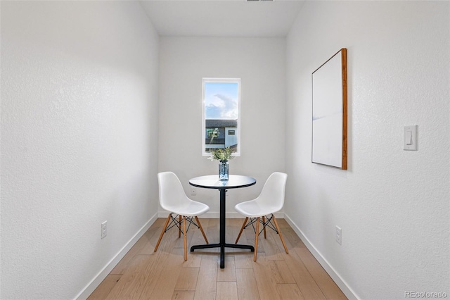972 Arapahoe Cir, Louisville, CO 80027 - dining space featuring light wood-type flooring and baseboards