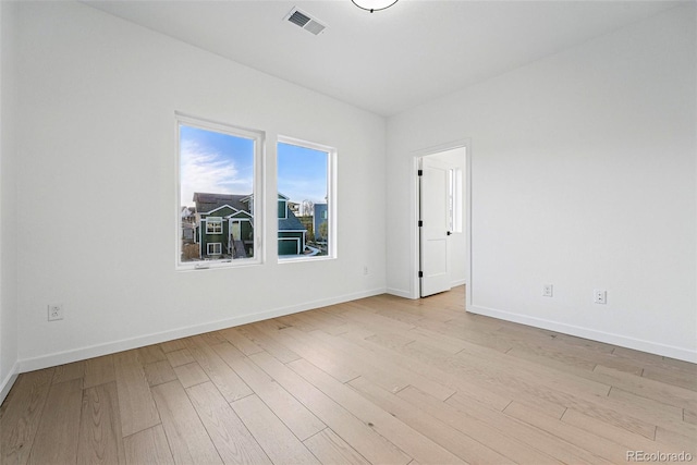 972 Arapahoe Cir, Louisville, CO 80027 - unfurnished room featuring baseboards, visible vents, and wood finished floors