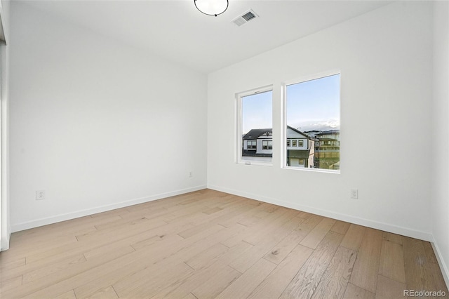 972 Arapahoe Cir, Louisville, CO 80027 - unfurnished room featuring baseboards, visible vents, and light wood-type flooring