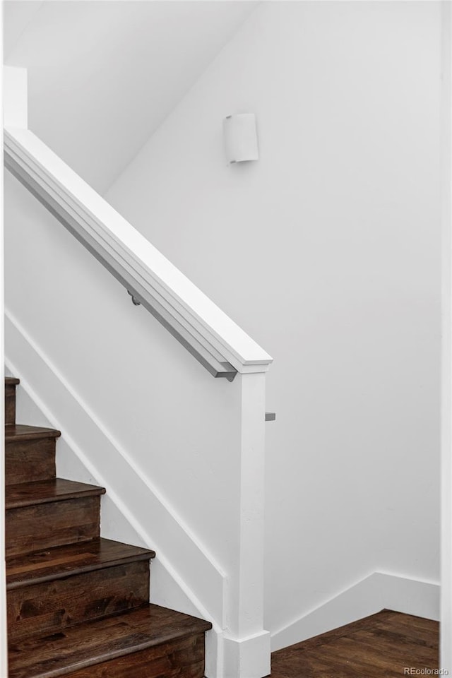 1715 Boulder St, Denver, CO 80211 - staircase featuring wood finished floors and baseboards