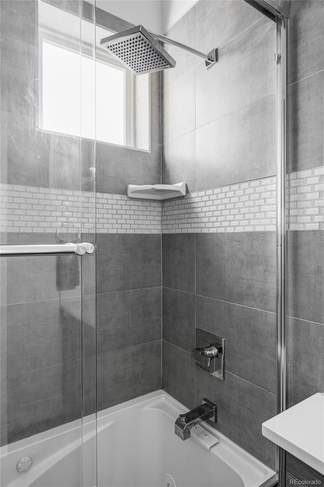1715 Boulder St, Denver, CO 80211 - bathroom featuring bath / shower combo with glass door