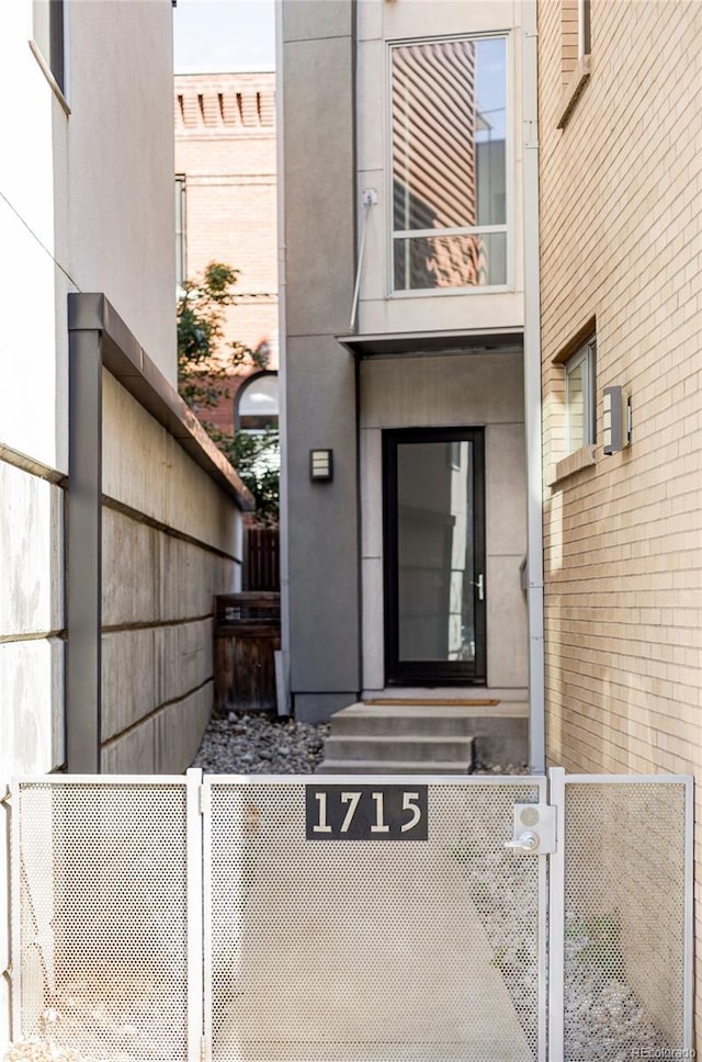 1715 Boulder St, Denver, CO 80211 - view of exterior entry featuring stucco siding