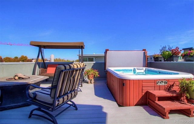 1715 Boulder St, Denver, CO 80211 - wooden deck featuring a hot tub and an outdoor fire pit