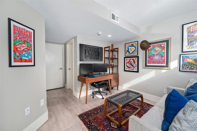 home office featuring light hardwood / wood-style floors