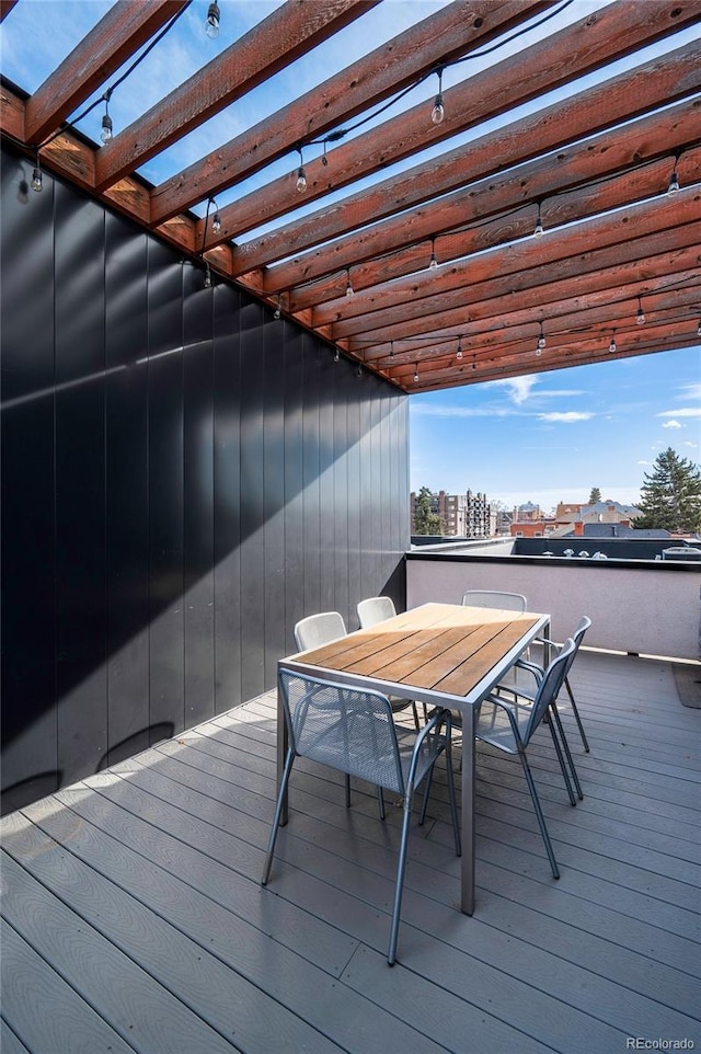 wooden deck with a pergola