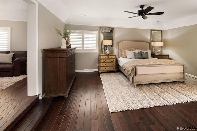 bedroom featuring ceiling fan and dark hardwood / wood-style flooring