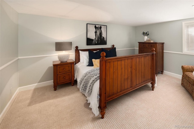 bedroom with light carpet