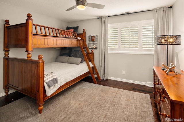 bedroom featuring ceiling fan and dark hardwood / wood-style flooring