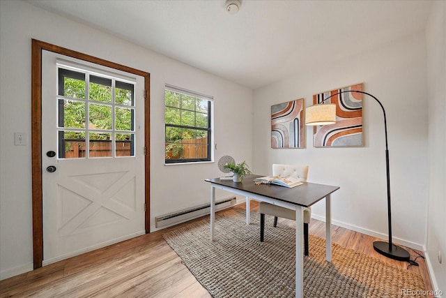 2429 Spruce St Unit 4, Boulder, CO 80302 - office with a baseboard radiator and light wood finished floors