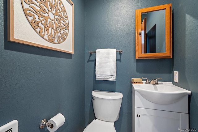 2429 Spruce St Unit 4, Boulder, CO 80302 - half bathroom featuring toilet and vanity