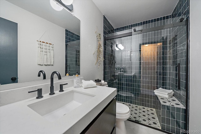 2429 Spruce St Unit 4, Boulder, CO 80302 - full bathroom featuring vanity, tiled shower, and tile patterned floors