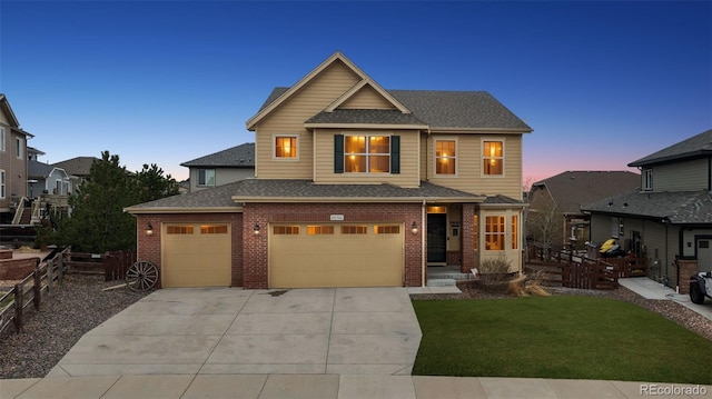 20366 Spruce Point Pl, Parker, CO 80134 - view of front facade featuring brick siding, driveway, a garage, and a shingled roof