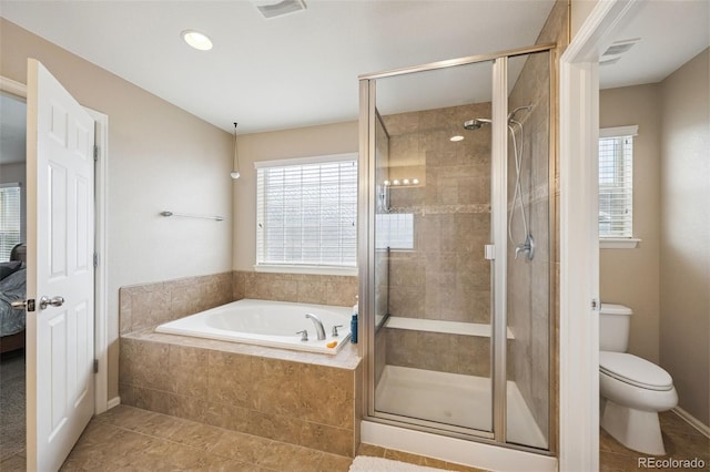 20366 Spruce Point Pl, Parker, CO 80134 - bathroom featuring a garden tub, a shower stall, plenty of natural light, and recessed lighting