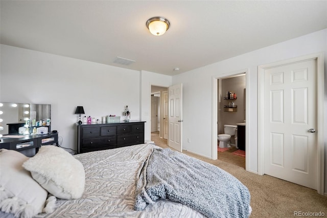 20366 Spruce Point Pl, Parker, CO 80134 - bedroom featuring light carpet and connected bathroom