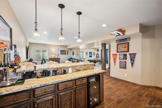 20366 Spruce Point Pl, Parker, CO 80134 - kitchen with beverage cooler, dark wood-type flooring, open floor plan, dark brown cabinets, and recessed lighting