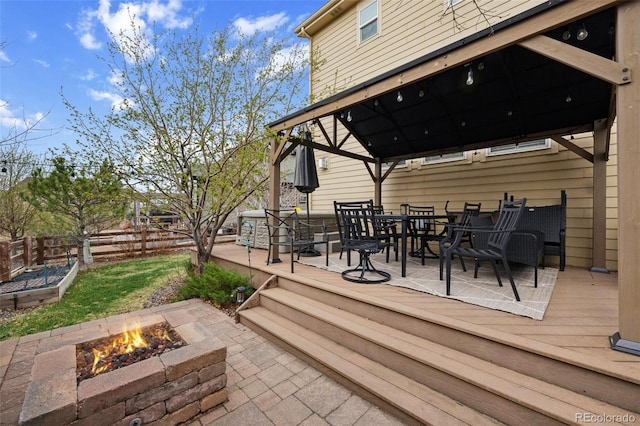 20366 Spruce Point Pl, Parker, CO 80134 - view of patio featuring a gazebo, an outdoor fire pit, outdoor dining area, and a deck