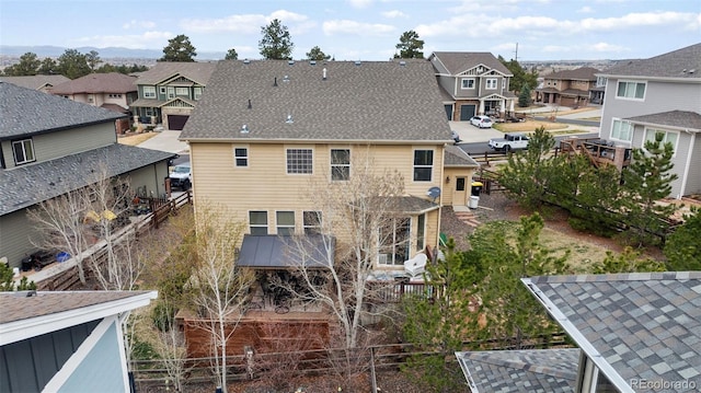 20366 Spruce Point Pl, Parker, CO 80134 - rear view of property featuring a residential view and a shingled roof