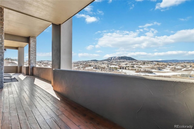 balcony featuring a mountain view