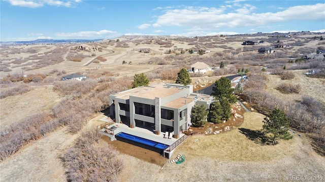 drone / aerial view featuring view of desert