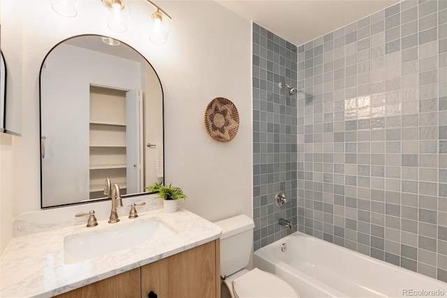 8335 Fairmount Dr Unit 7-208, Denver, CO 80247 - full bathroom with toilet, bathtub / shower combination, and vanity