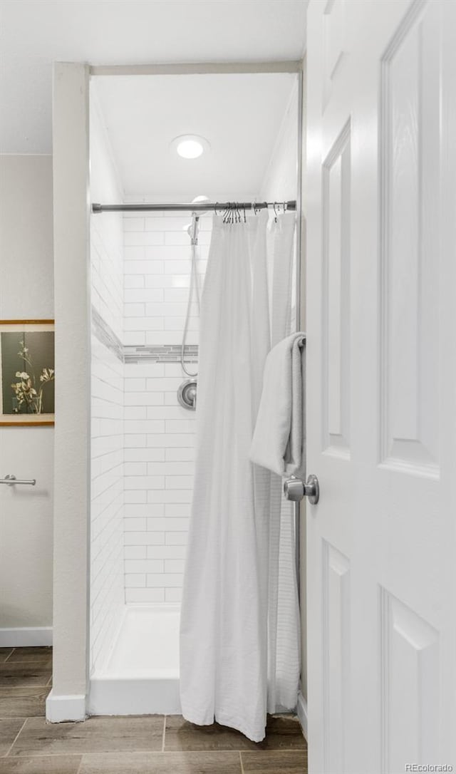 bathroom featuring walk in shower