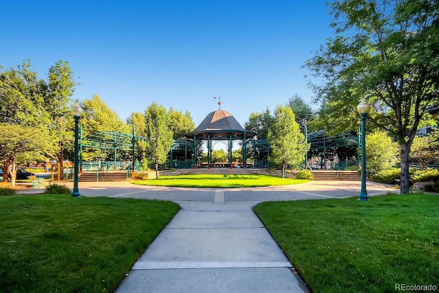 view of community with a lawn and a gazebo