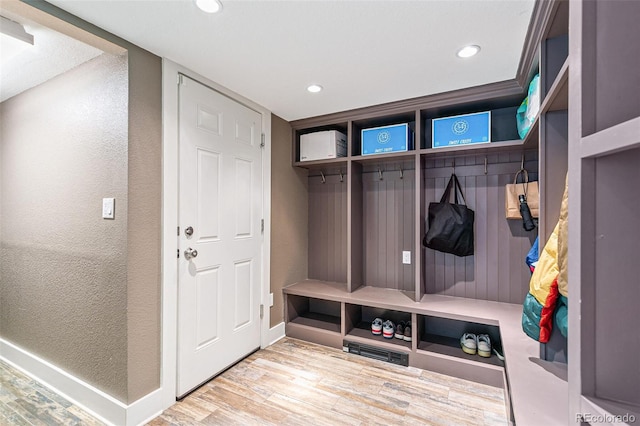 mudroom with hardwood / wood-style flooring