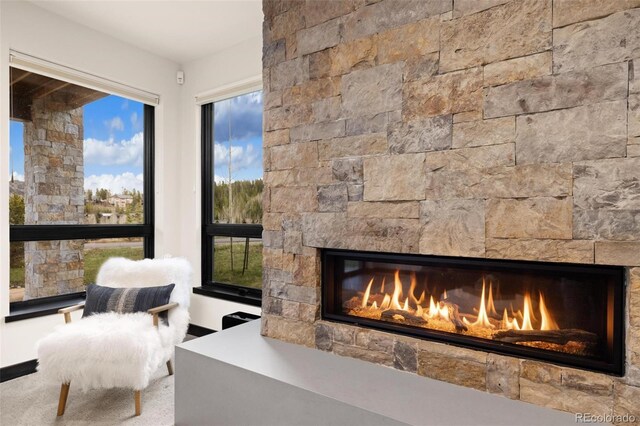 2800 Honors Ct, Silverthorne, CO 80498 - living area featuring a stone fireplace