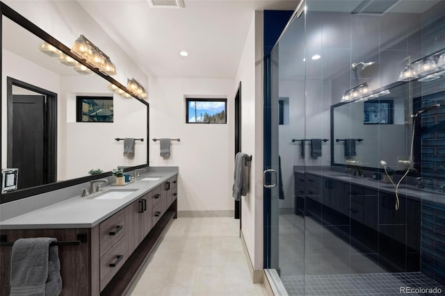 2800 Honors Ct, Silverthorne, CO 80498 - full bath with double vanity, a stall shower, baseboards, tile patterned floors, and recessed lighting