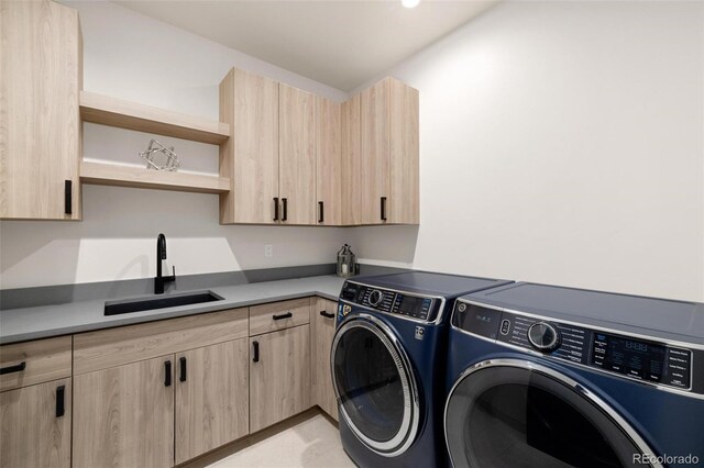 2800 Honors Ct, Silverthorne, CO 80498 - laundry area with separate washer and dryer and cabinet space