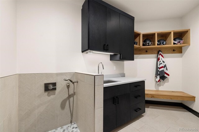 2800 Honors Ct, Silverthorne, CO 80498 - mudroom featuring a sink and light tile patterned floors