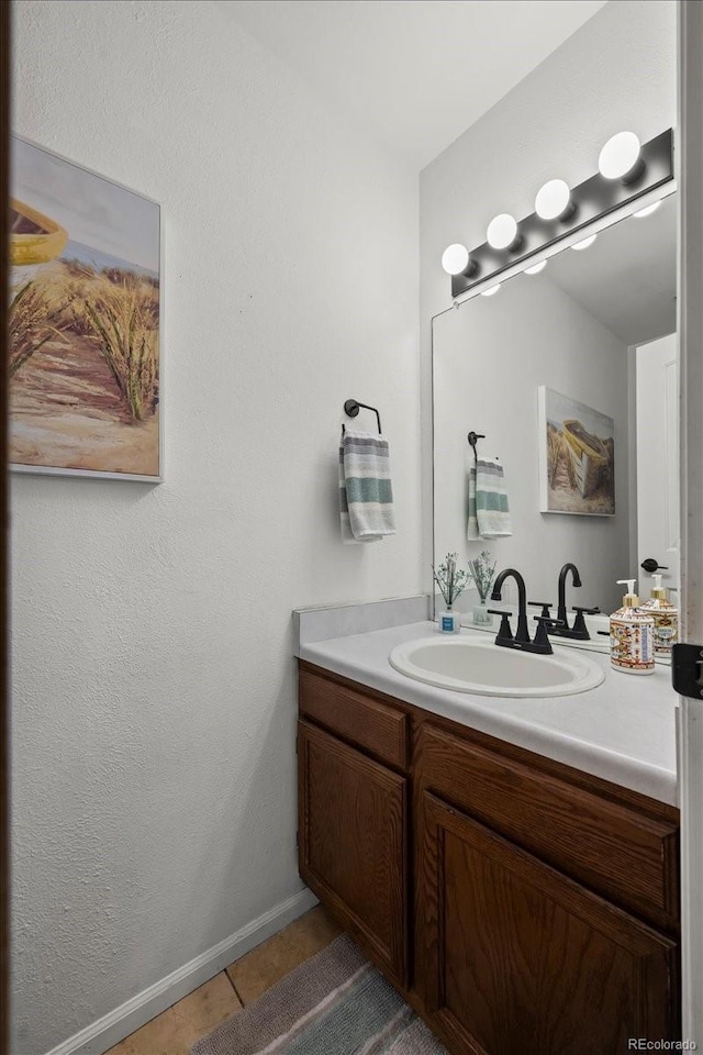 8051 W 78th Cir, Arvada, CO 80005 - bathroom with vanity and tile patterned floors