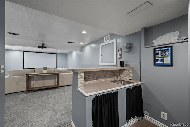 8051 W 78th Cir, Arvada, CO 80005 - home theater room with wet bar and recessed lighting