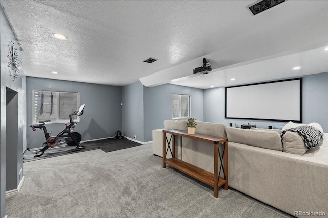 8051 W 78th Cir, Arvada, CO 80005 - carpeted cinema room featuring a textured ceiling and recessed lighting
