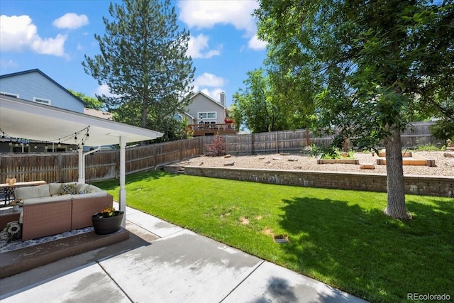 8051 W 78th Cir, Arvada, CO 80005 - fenced backyard with an outdoor hangout area and a patio