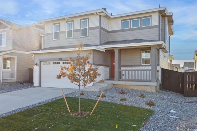 front facade featuring a porch, a garage, and a front lawn