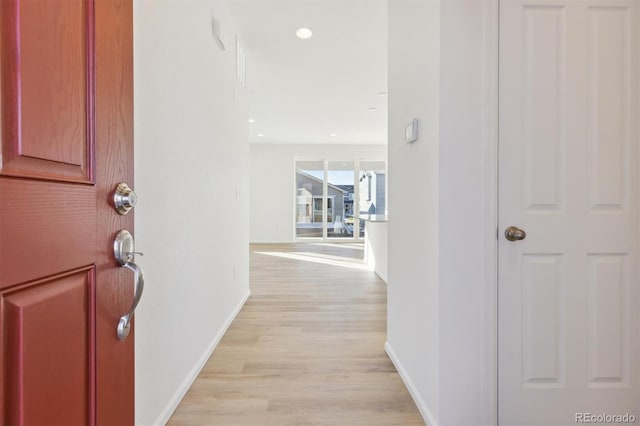 hallway featuring light wood-type flooring