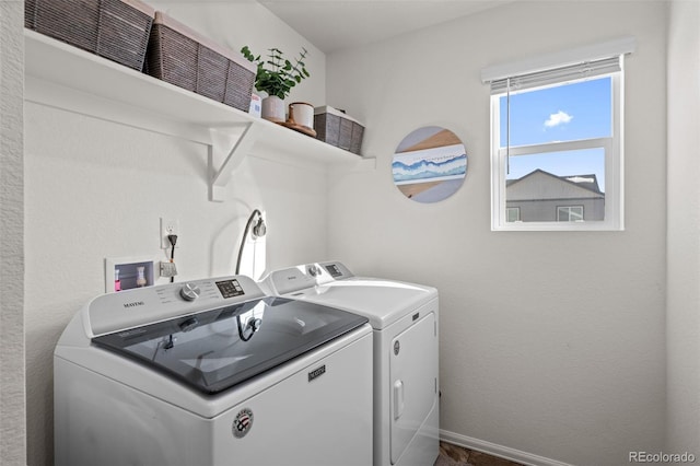 laundry area featuring independent washer and dryer