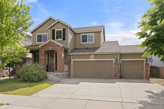 41 Jordan Ln, Erie, CO 80516 - traditional-style home featuring brick siding, concrete driveway, fence, roof with shingles, and a garage