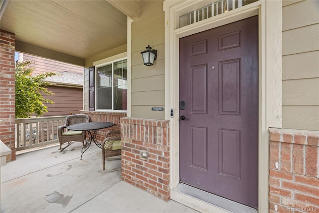 41 Jordan Ln, Erie, CO 80516 - doorway to property with a porch