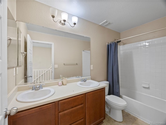 41 Jordan Ln, Erie, CO 80516 - bathroom featuring toilet, double vanity, shower / bath combo, and tile patterned floors